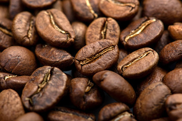 Coffee beans close-up background. Fresh roasted