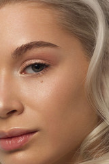 Closeup of beauty woman with clean shiny skin and natural cosmetics. Beautiful extrem eyelash and...