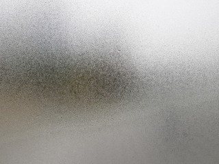 Transparent glass with fog up and water drop on it during winter season.Close up shot of Natural...