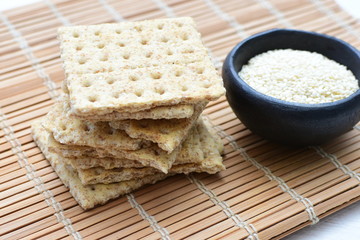 Healthy sesame biscuits (Sesamum indicum), whole grain cereal and jam