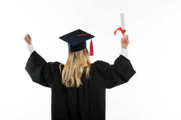 Back view of student holding diploma isolated on white
