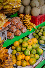Fresh fruit market with mango, mangosteen and pineapple in Bali