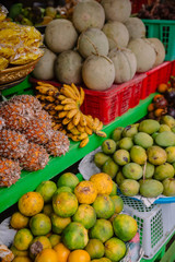 Fresh fruit market with mango, mangosteen and pineapple in Bali