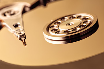 Disassembled hard drive from the computer, hdd with mirror effect. Opened hard drive from the...