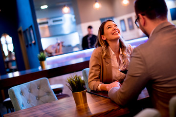 Young couple enjoying lunch in the restaurant