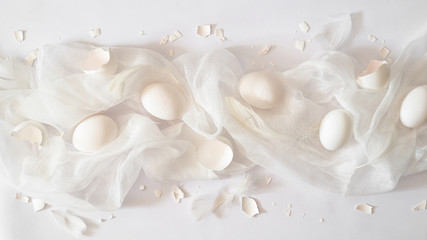 Totally white. Easter eggs on a white cloth. Egg shell. Easter concept