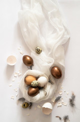 Obraz na płótnie Canvas Totally white. Easter eggs on a white cloth. Egg shell. Easter concept