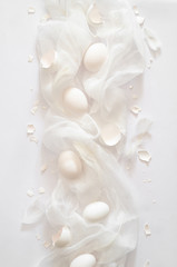 Totally white. Easter eggs on a white cloth. Egg shell. Easter concept
