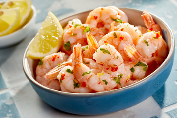Bowl of fresh sauteed scampi seasoned with herbs