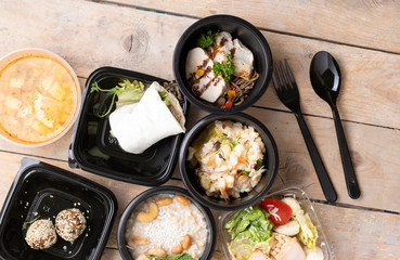 Meal prep of breakfast, lunch, and dinner for full day consisting of steel cut oatmeal, southwest chicken salad, and corned beef and cabbage, flat lay