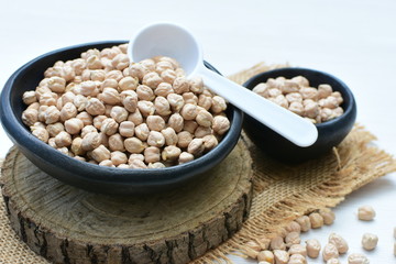 Dried chickpeas (Cicer arietinum) in containers