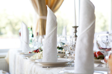 Served for banquet restaurant table with dishes, snack, wine glasses