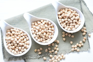 Dried chickpeas (Cicer arietinum) in containers