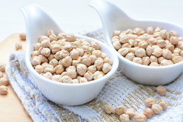 Dried chickpeas (Cicer arietinum) in containers