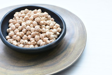 Dried chickpeas (Cicer arietinum) in containers