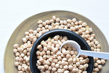 Dried chickpeas (Cicer arietinum) in containers