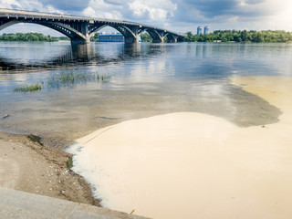 Image of river being polluted by toxic wastes from factories