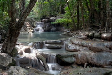 Waterfall in national park in jungle, long exposure, in Kanchanaburi, Thailand