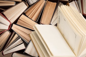 Naklejka premium Collection of the old library book pile