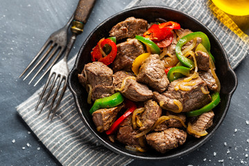 Cookef beef cuts with vegetables