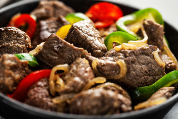 Cookef beef cuts with vegetables