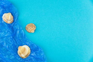 Plastic pollution in ocean concept. Carrier bags in sea shell. Shellfish in bad ecology concept.
