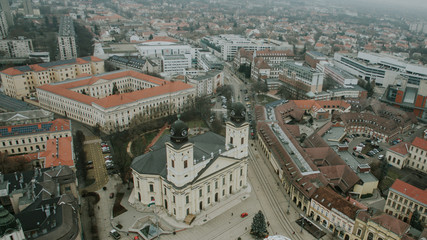 Obraz premium Historic city of Debrecen, Hungary. Old town with architecture, church and skyscrapers.