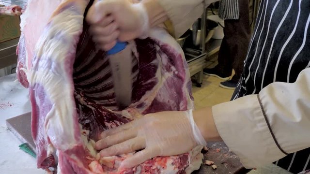 Cutting of sheep meat. Make a sacrifice of a sheep on Kurban bayram. Butcher cut meat