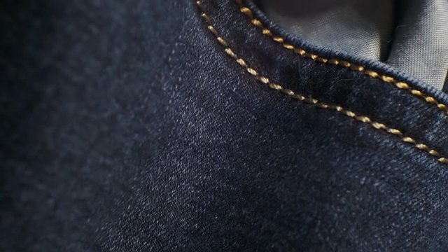 old worn jeans cloth closeup.moving background for your design