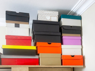 A multi-colored cardboard boxes overlapping