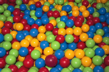 Fototapeta na wymiar Children's playpen colorful balls. Top down view.