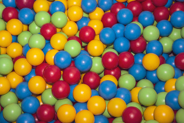 Children's playpen colorful balls. Top down view.