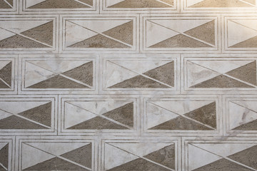 Geometric ornament on the wall. Sgraffito technique. Envelope facade.