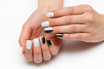 Holiday manicure. White rub on square nails closeup. Black and green manicure. Black and white оmbre