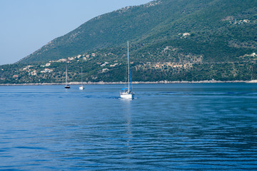 Fototapeta na wymiar Beautiful view of water, boat and mountains.