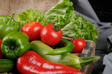 Red and green peppers with tomato and lettuce.