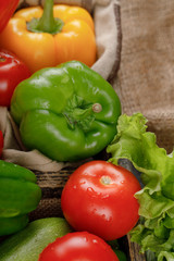 Color peppers with tomatoes and greenery.