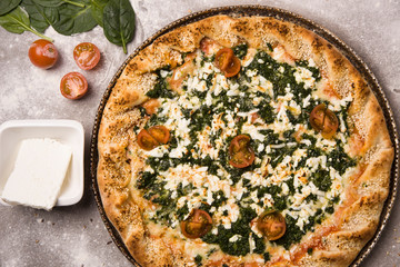 Spinach pizza for vegetarians. Healthy nutrition vegan lifestyle.,Delicious pizza which you can eat even on a diet. Only high quality and low fat products like spinach and feta cheese
