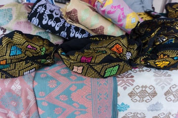 songket traditional fabric on market
