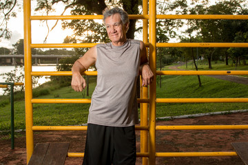 Fototapeta premium Senior Man Relaxing after Working out at a Fitness Park