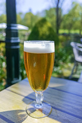 Cold Belgian white beer served outside in sunny day