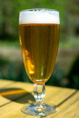 Cold Belgian white beer served outside in sunny day