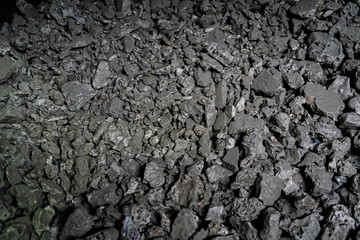 Detail of many pieces of foundry metal material stacked together. Iron and steel industry