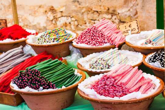Colorful liquorice sweets for sale on Porreres Market. Regaliz, 3&euro;/unidad (Liquorice, &euro;3/unit). 1&euro;/unidad (&euro;1/unit). Porreres, Majorca, Spain
