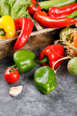 Mix of color chili peppers with tomato and garlics.