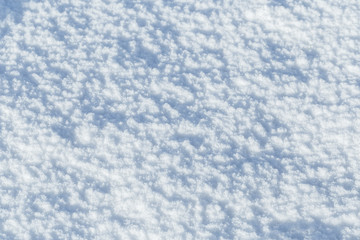 Texture of natural snow. Top view of the snow.