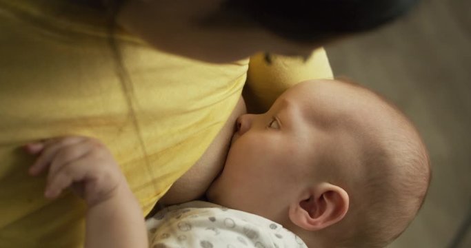 Mother breastfeeding her child