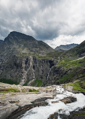 Norway waterfall in summer. Norwegian beautiful nature and nordic typical mountain landscape in Trollstigen