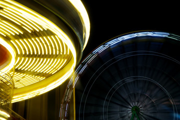 Carousel in the city park at night. Long exposure.