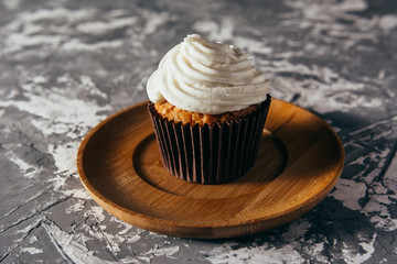 Cupcake on a gray background.